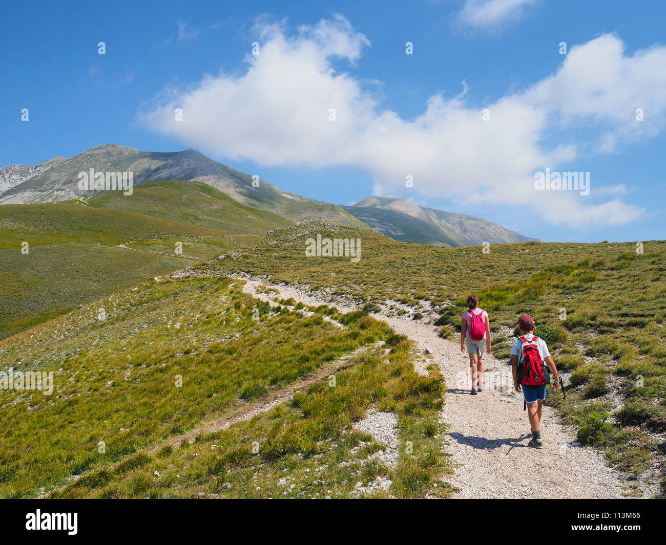 Italy, Umbria, Sibillini mountains, two children hiking mount Vettore Stock Photo