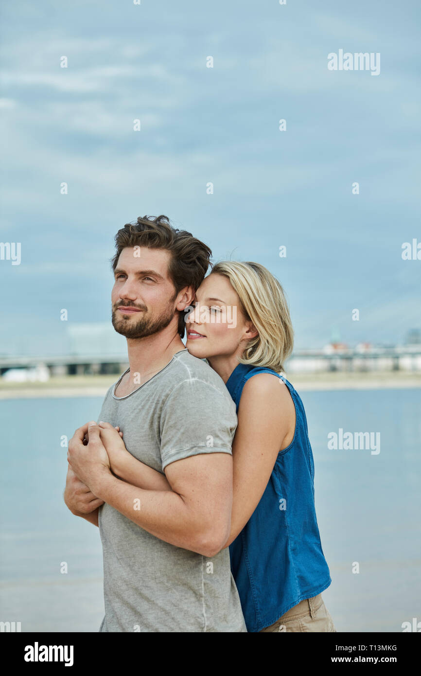 Affectionate couple hugging hi-res stock photography and images - Alamy
