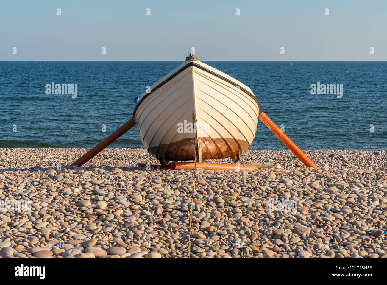 Fishing Boat On The Pebble Beach Of Budleigh Salterton Jurassic Coast Devon UK Stock Photo