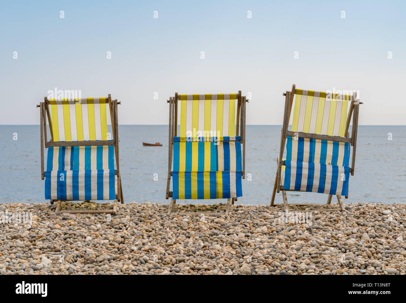 Empty Deck Chairs On The Pebble Beach In Beer Devon Uk Looking