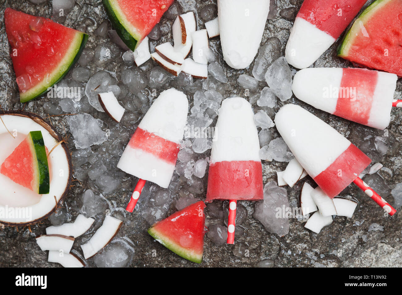 Homemade watermelon coconut ice lollies on crushed ice Stock Photo Alamy
