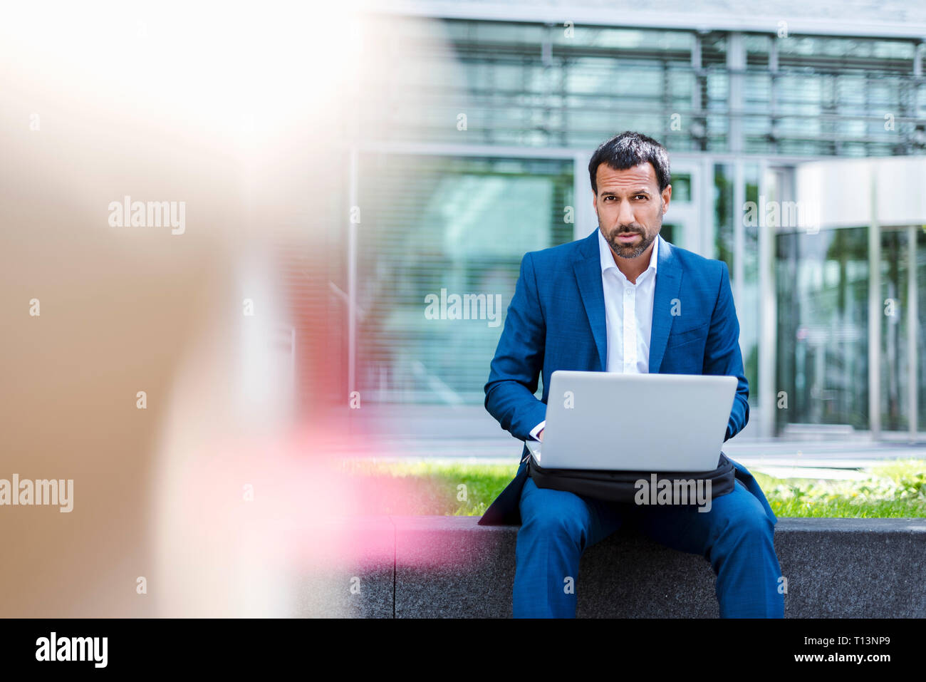 Businessman using laptop Stock Photo