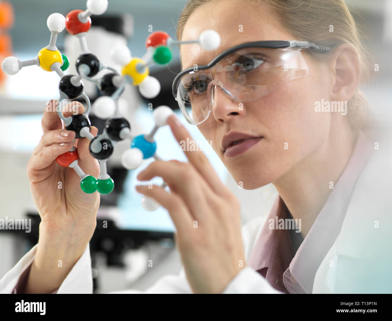 Scientist preparing a sample in a vial ready for analysis in the laboratory Stock Photo