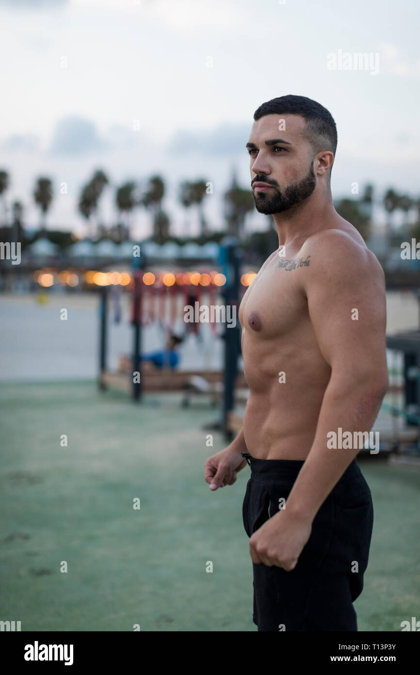 Portrait of barechested muscular man outdoors Stock Photo