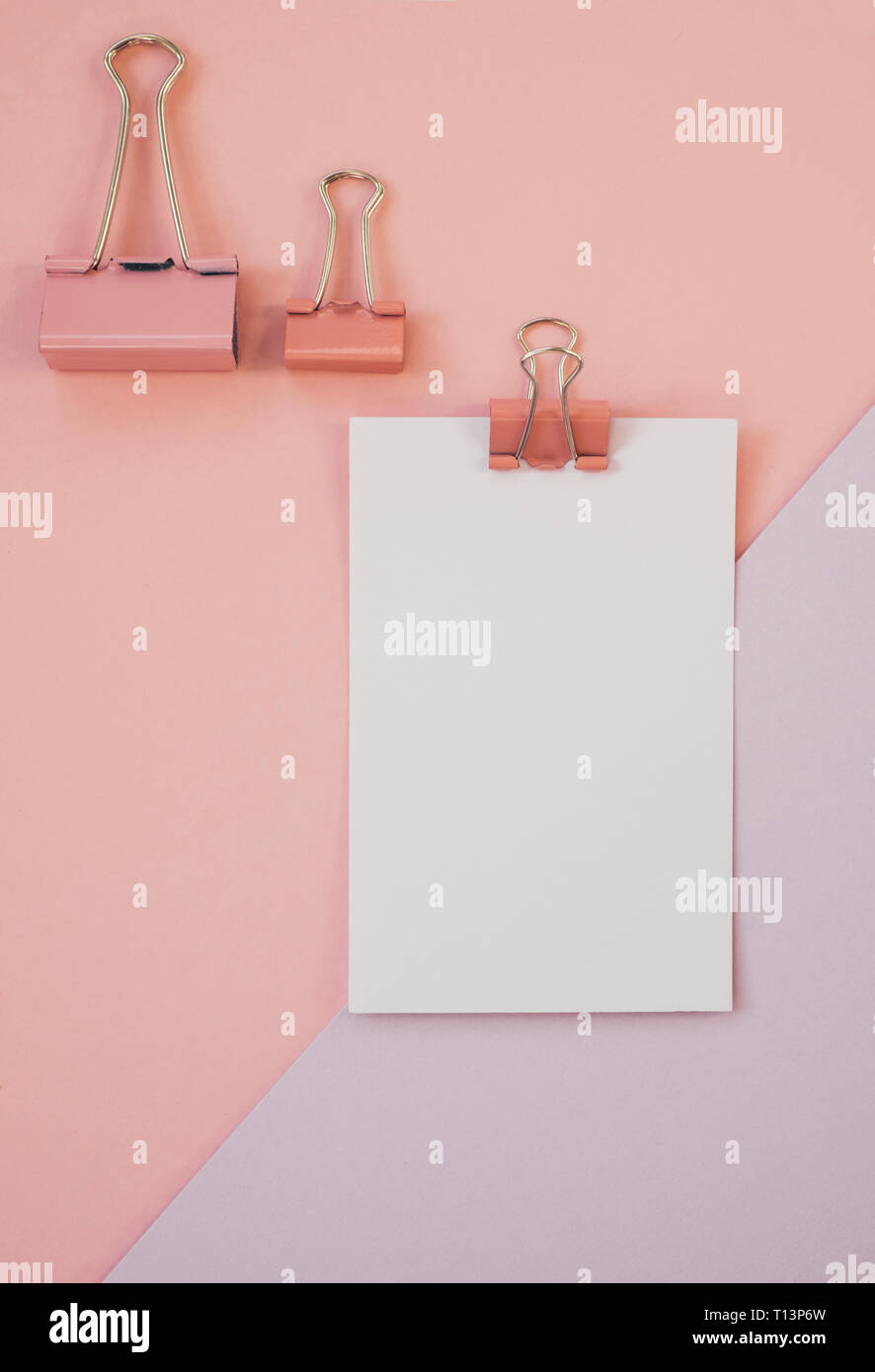 Blank paper against pink and purple background Stock Photo