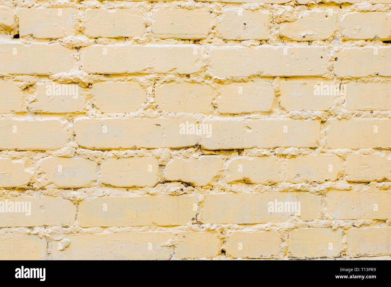 Yellow bricks pattern on wall for abstract background. Stock Photo