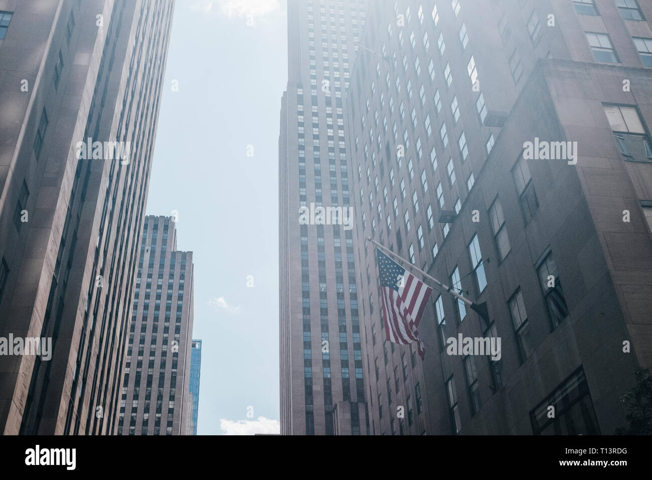 USA, New York City, Manhattan, Flag of the USA on Rockefeller Center Stock Photo