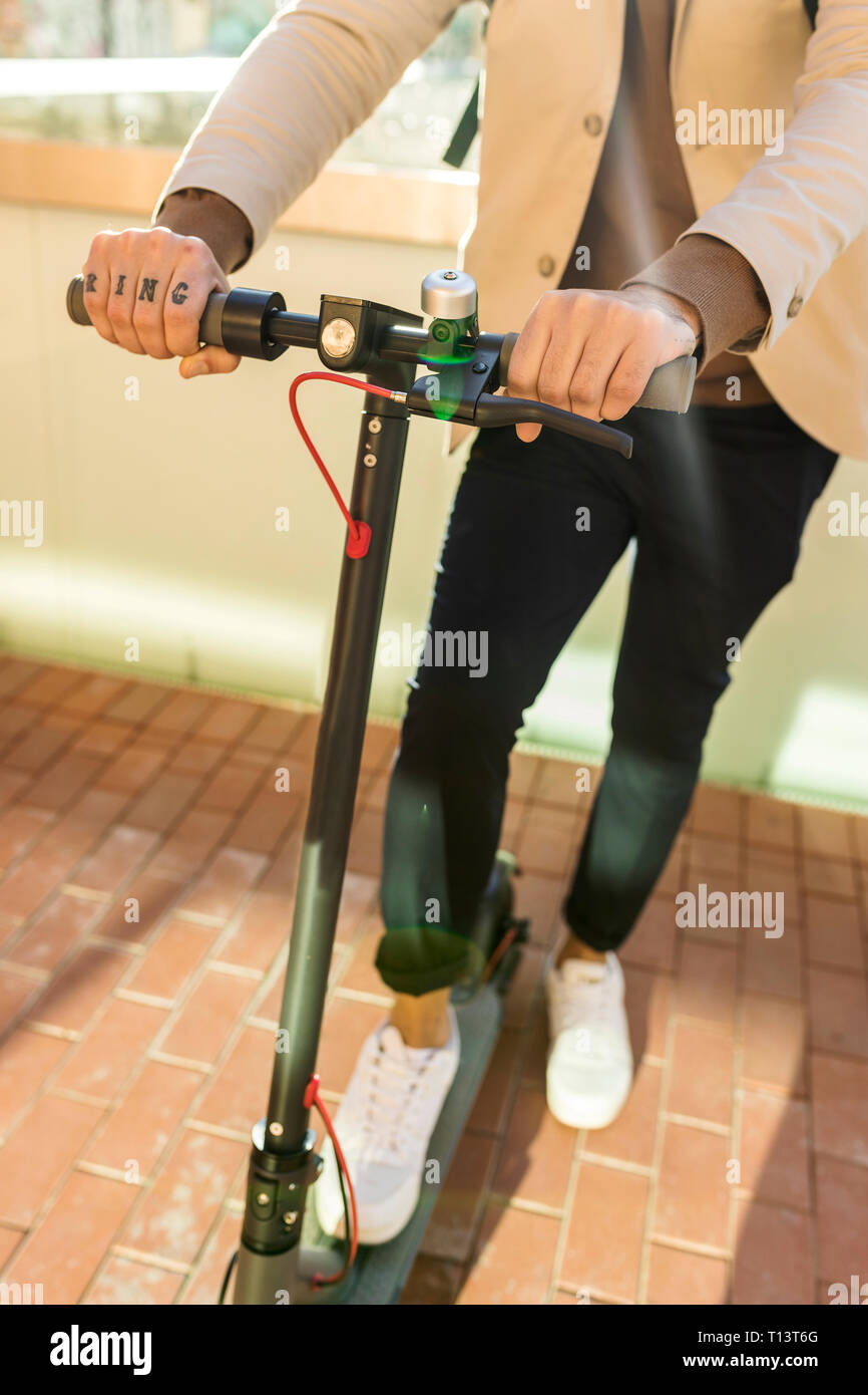Man e scooter hi-res stock photography and images - Alamy