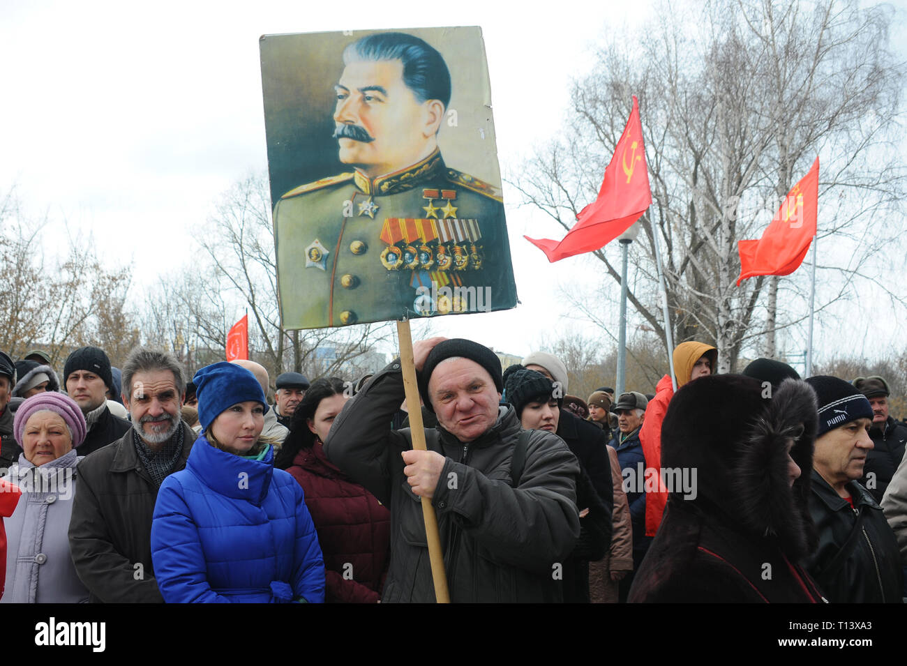 Tambov, Tambov region, Russia. 23rd Mar, 2019. March 23, 2019. The Communist party of Russia is holding an all-Russian mass social and political action under the slogan '' we will Protect the social and economic rights of citizens!''. Rallies are held in many cities of Russia. In Tambov meeting took place in '' Rasskazovsky square''. In the picture- In the picture-a meeting of Communists in Tambov (Russia). In the center-a man with a portrait of Joseph Stalin Credit: Demian Stringer/ZUMA Wire/Alamy Live News Stock Photo