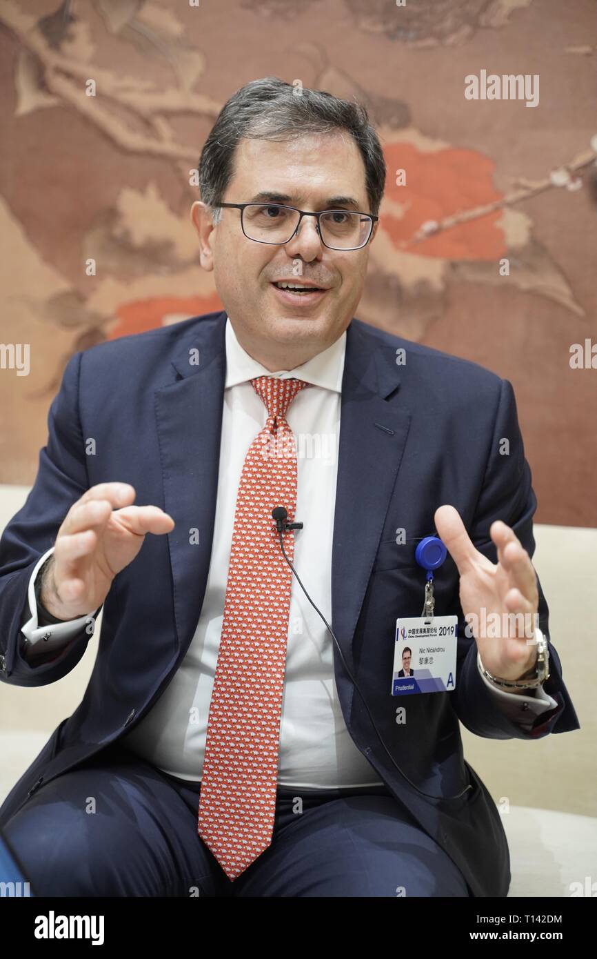 Beijing, China, 23rd march, 2019. (190323) -- BEIJING, March 23, 2019 (Xinhua) -- Nic Nicandrou, chief executive officer of Prudential Corporation Asia, receives an interview with Xinhua during the China Development Forum 2019 in Beijing, capital of China, March 23, 2019. The three-day China Development Forum, which kicked off Saturday, will focus on key issues such as the supply-side structural reform, new measures of proactive fiscal policy, and the opening-up of the financial sector and financial stability. Credit: Xinhua/Alamy Live News Stock Photo