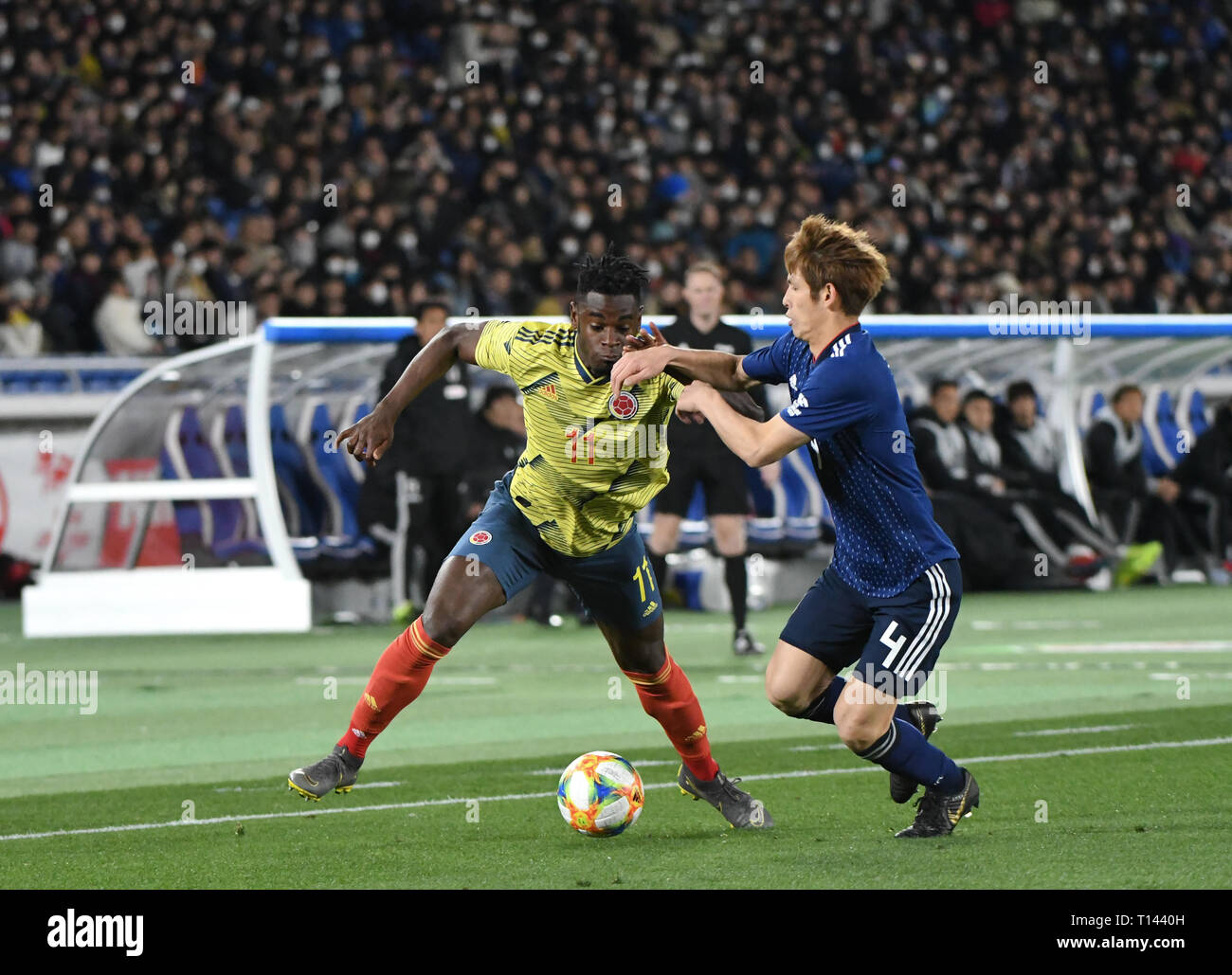 Tokyo, Japan. 22nd Mar, 2019. D. Zapata of Colombia fights for the ball  with Sazaki of Japan during the Kirin Challenge Cup 2019 between Colombia  and Japan at the International Yokohama Stadium