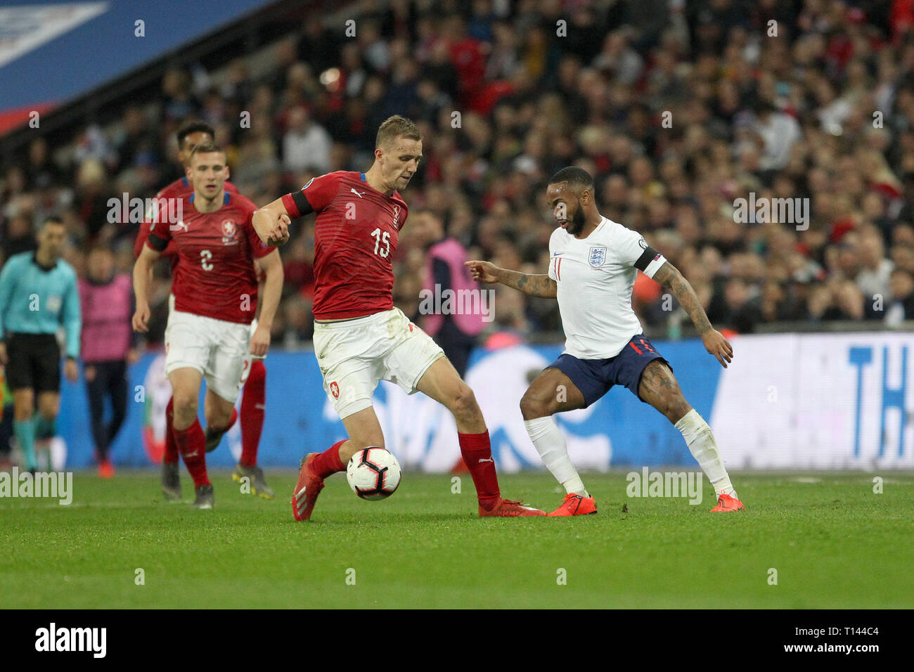 London, UK. 22nd Mar, 2019. Tomas Soucek of Czech Republic gets the better of Raheem Sterling of England during the UEFA Euro 2020 Qualifying Group A match between England and Czech Republic at Wembley Stadium on March 22nd 2019 in London, England. (Photo by Mick Kearns/phcimages.com) Credit: PHC Images/Alamy Live News Stock Photo