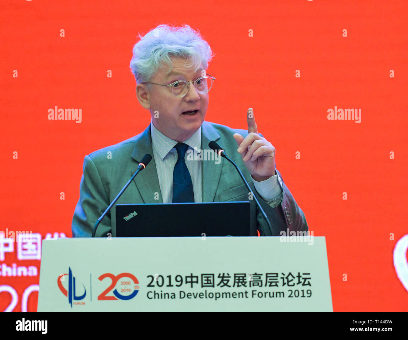 Beijing, China, 23rd march, 2019. (190323) -- BEIJING, March 23, 2019 (Xinhua) -- Oscar-winning director Malcolm Clarke speaks at the Economic Summit of China Development Forum 2019 in Beijing, capital of China, March 23, 2019. The three-day China Development Forum, which kicked off Saturday, will focus on key issues such as the supply-side structural reform, new measures of proactive fiscal policy, and the opening-up of the financial sector and financial stability. Credit: Xinhua/Alamy Live News Stock Photo