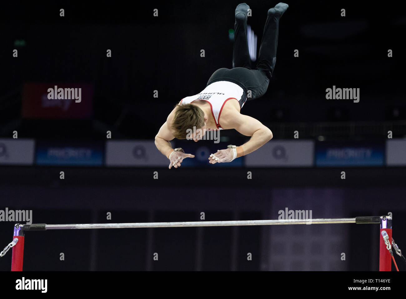 London, UK. 23rd March, 2019. Sam Oldham performs High Bar during the Matchroom Multisport presents the 2019 Superstars of Gymnastics at The O2 Arena on Saturday, 23 March 2019. LONDON ENGLAND. Credit: Taka G Wu/Alamy News Stock Photo