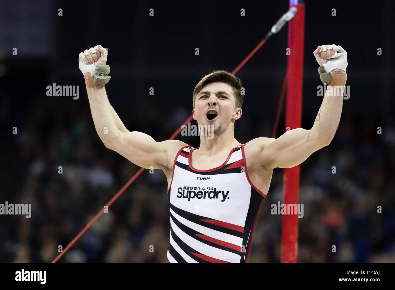 London, UK. 23rd March, 2019. Sam Oldham performs High Bar during the Matchroom Multisport presents the 2019 Superstars of Gymnastics at The O2 Arena on Saturday, 23 March 2019. LONDON ENGLAND. Credit: Taka G Wu/Alamy News Stock Photo