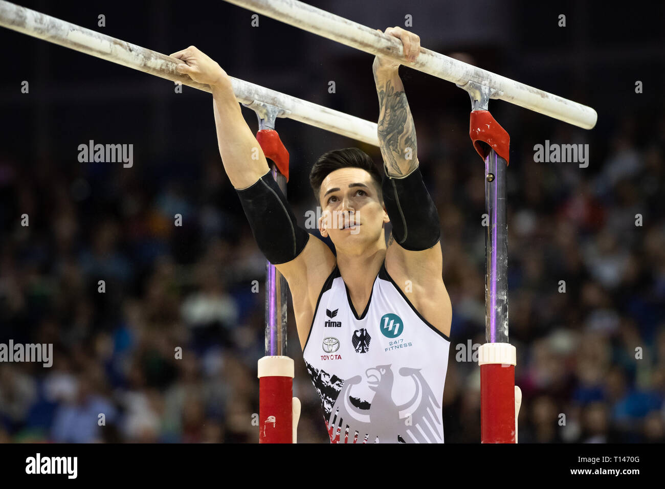 London, UK. 23rd March, 2019. Marcel Nguyen performs on the Parallel Bars during the Matchroom Multisport presents the 2019 Superstars of Gymnastics at The O2 Arena on Saturday, 23 March 2019. LONDON ENGLAND. Credit: Taka G Wu/Alamy News Stock Photo