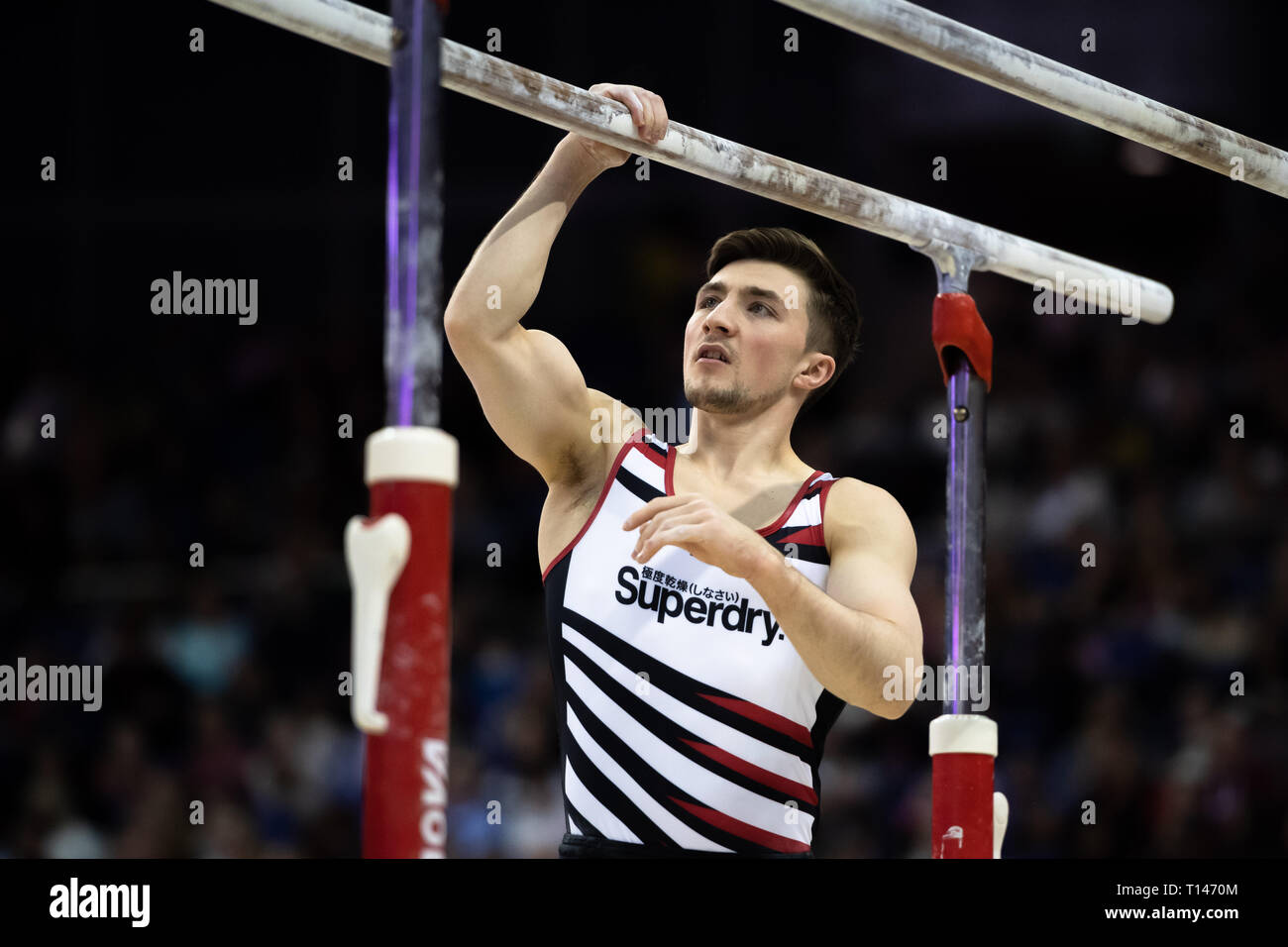 London, UK. 23rd March, 2019. Sam Oldman performs on the Parallel Bars during the Matchroom Multisport presents the 2019 Superstars of Gymnastics at The O2 Arena on Saturday, 23 March 2019. LONDON ENGLAND. Credit: Taka G Wu/Alamy News Stock Photo
