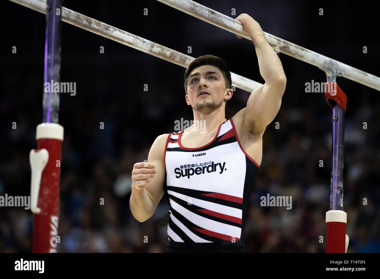 London, UK. 23rd March, 2019. Sam Oldman performs on the Parallel Bars during the Matchroom Multisport presents the 2019 Superstars of Gymnastics at The O2 Arena on Saturday, 23 March 2019. LONDON ENGLAND. Credit: Taka G Wu/Alamy News Stock Photo