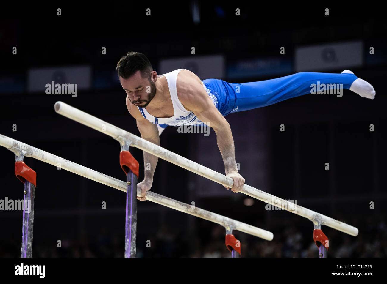 London, UK. 23rd March, 2019. James Hall performs on the Parallel Bars during the Matchroom Multisport presents the 2019 Superstars of Gymnastics at The O2 Arena on Saturday, 23 March 2019. LONDON ENGLAND. Credit: Taka G Wu/Alamy News Stock Photo