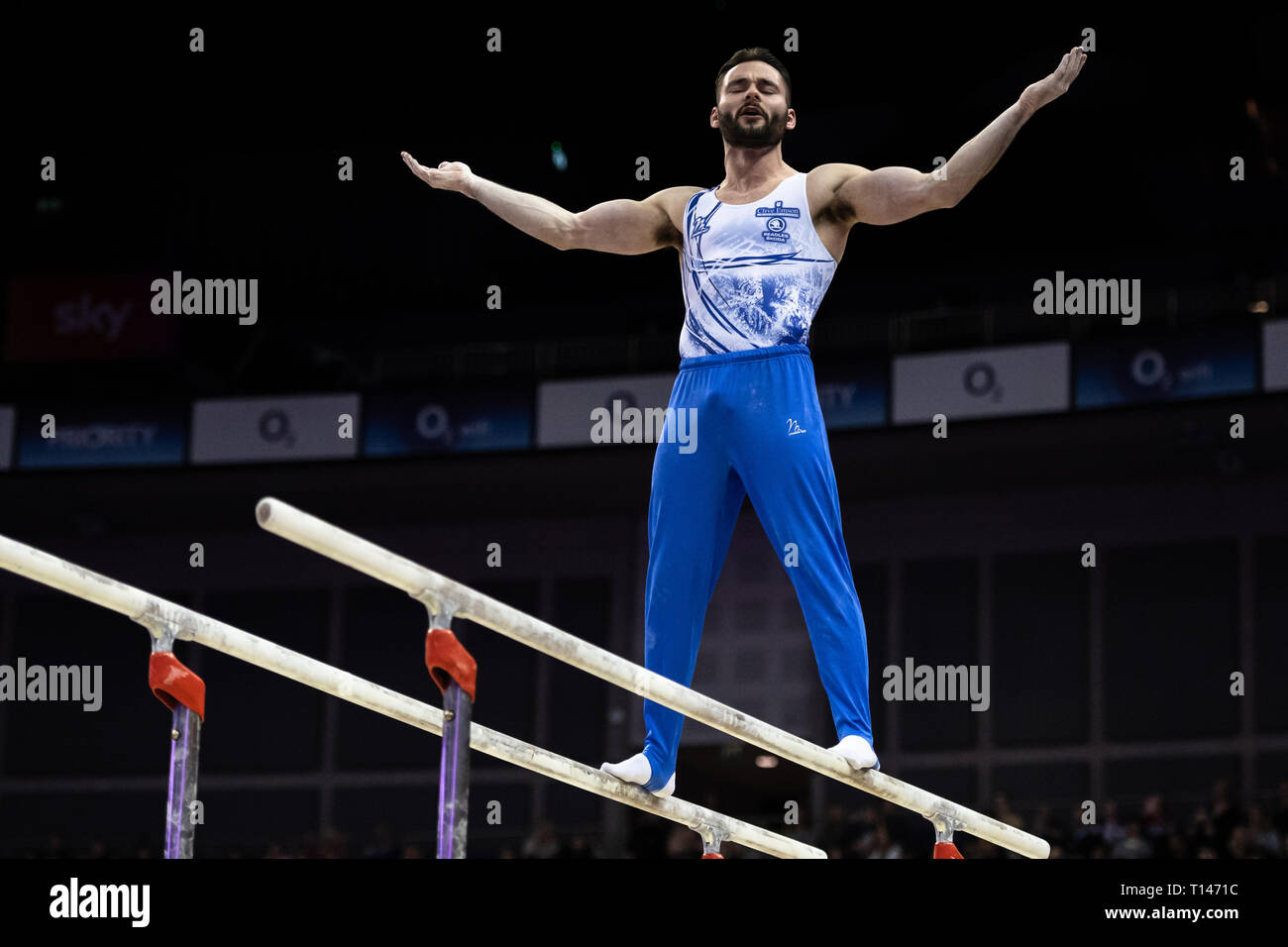 London, UK. 23rd March, 2019. James Hall performs on the Parallel Bars during the Matchroom Multisport presents the 2019 Superstars of Gymnastics at The O2 Arena on Saturday, 23 March 2019. LONDON ENGLAND. Credit: Taka G Wu/Alamy News Stock Photo
