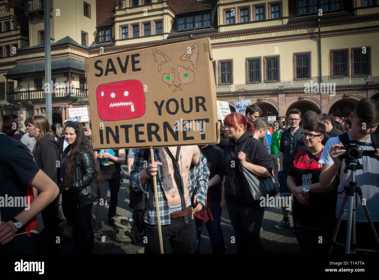 Save Your Internet Protest in Leipzig, Germany. Protesting against the Copyright Directive known as Article 13 officially called The European Union Directive on Copyright in the Digital Single Market, It requires the likes of YouTube, Facebook and Twitter to take more responsibility for copyrighted material being shared illegally on their platforms. It's known as Article 13 its most controversial serction. Critics claim it will have a detrimental impact on creators online.  Credit: Craig Stennett/Alamy Live News 23/3/2019 Leipzig, Germany Stock Photo