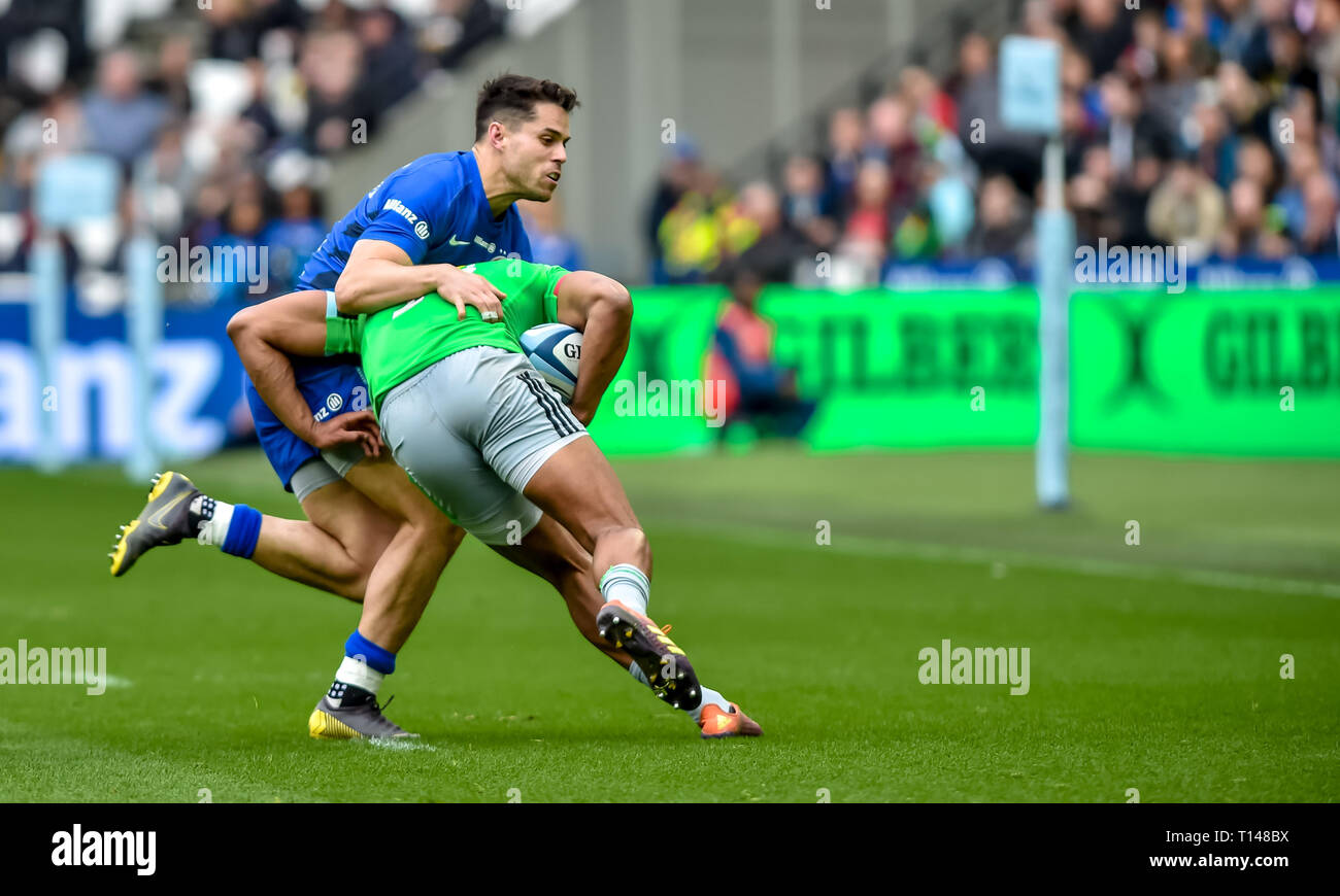 Saracens Sean Maitland tackles during the Aviva Premiership match between Saracens and Harlequins at the London Stadium, Queen Elizabeth Olympic Park , London, England on 23 March 2019. Photo by Phil Hutchinson. Editorial use only, license required for commercial use. No use in betting, games or a single club/league/player publications. Stock Photo