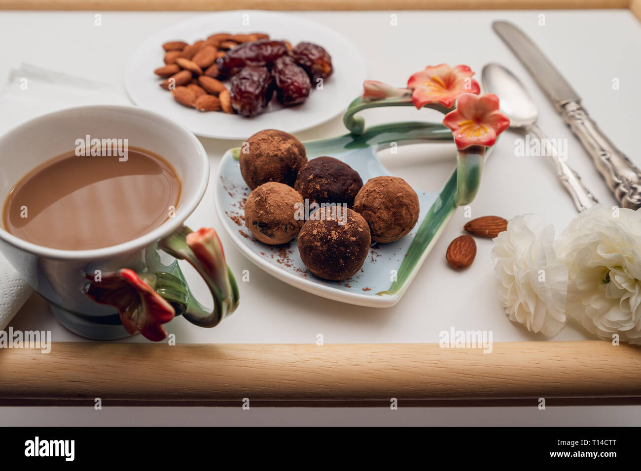 Homemade dates chocolate candy and cup of coffee Stock Photo Alamy