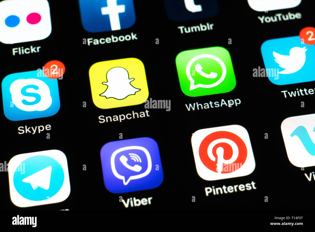 Apple iPhone X with icons of social media facebook, instagram, twitter