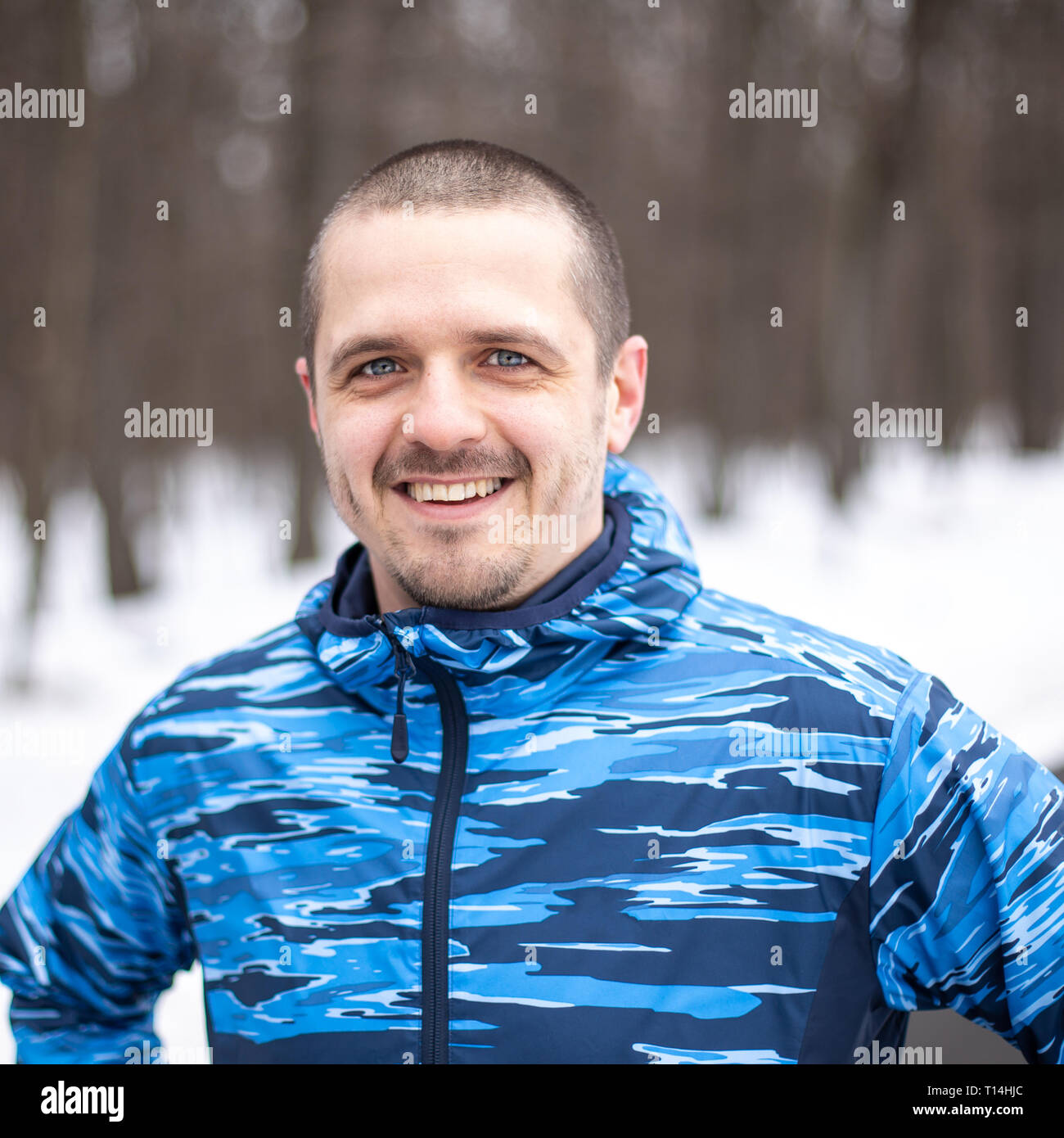 Portrait of sportsman outdoor in winter season Stock Photo