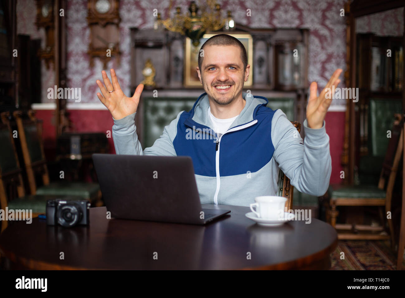 Man freelancer or blogger or vlogger telling something Stock Photo