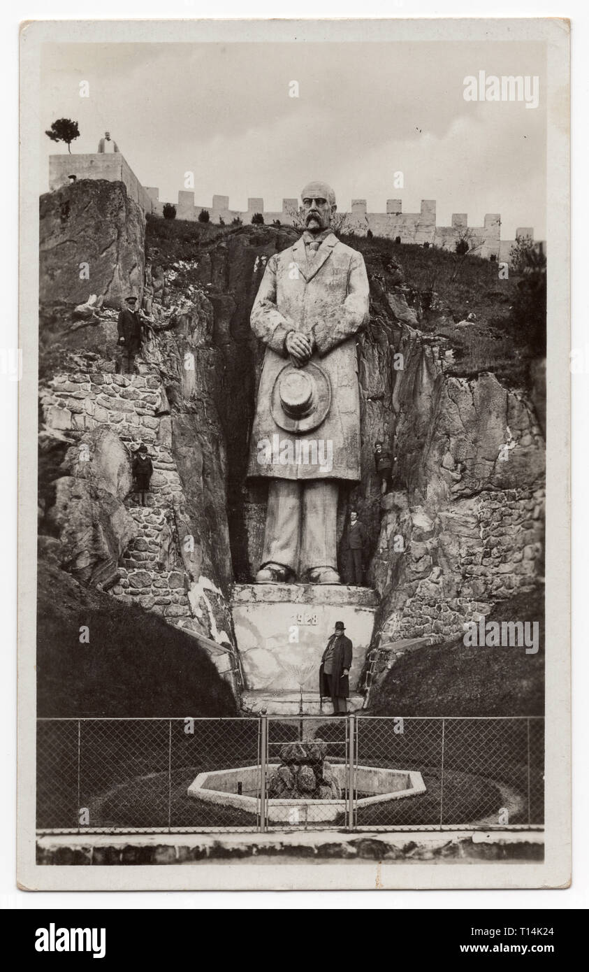 Huge statue of the first president of Czechoslovakia Tomáš Garrigue Masaryk carved in the rock by Czech amateur sculptor Stanislav Rolínek in 1928 near Rudka u Kunštátu in Moravia, Czechoslovakia (now Czech Republic). Black and white photograph by Czech photographer Karel Čuda on the Czechoslovak vintage postcard issued by local publisher František Burian before 1939. The statue was destroyed by the Nazi authorises in the 1940s. Courtesy of the Azoor Postcard Collection. Stock Photo