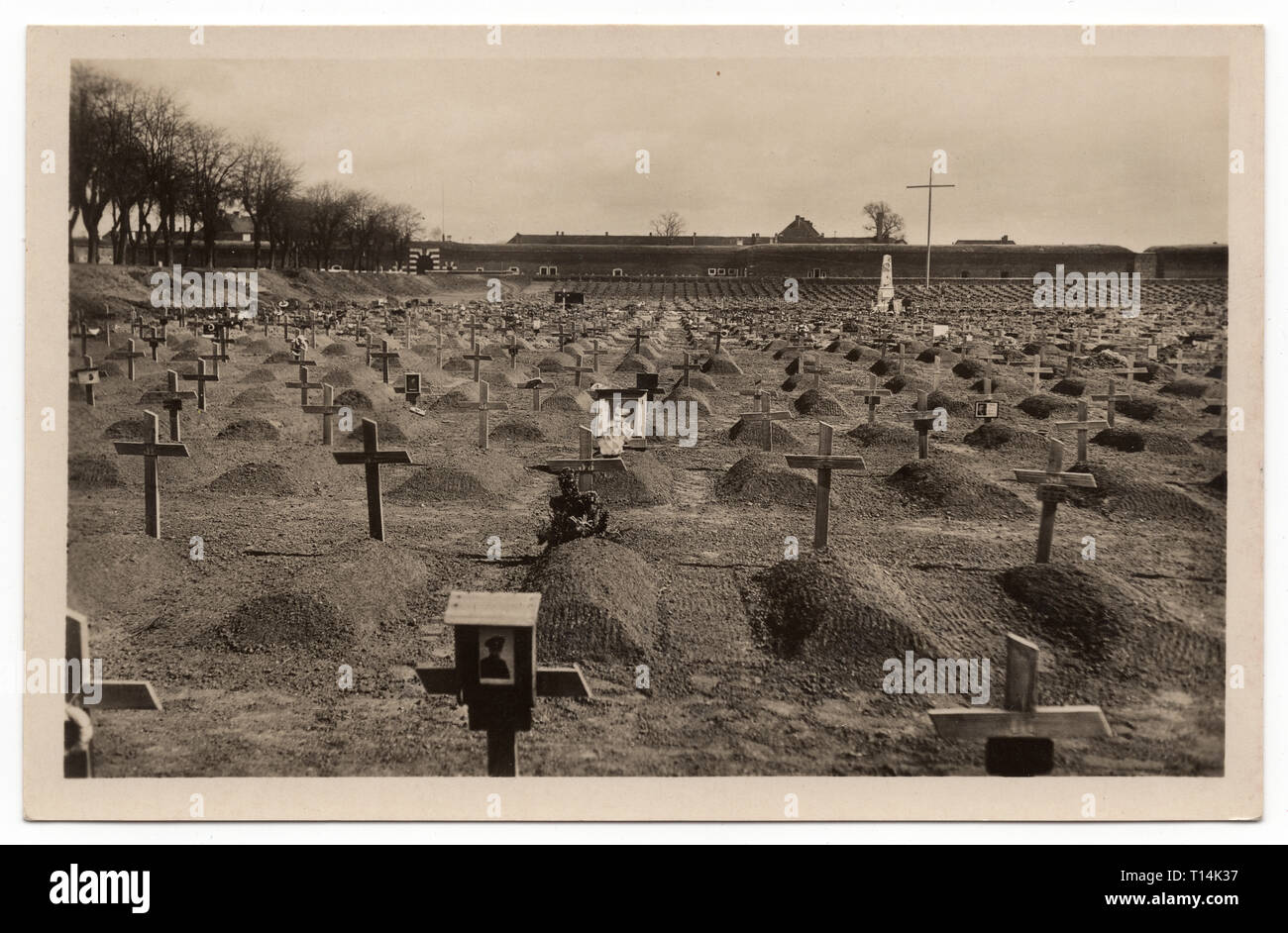National Cemetery (Národní hřbitov) near the Theresienstadt Small Fortress (Malá pevnost) in Terezín, Czechoslovakia, depicted in the Czechoslovak vintage postcard issued in 1945. Courtesy of the Azoor Postcard Collection. Stock Photo