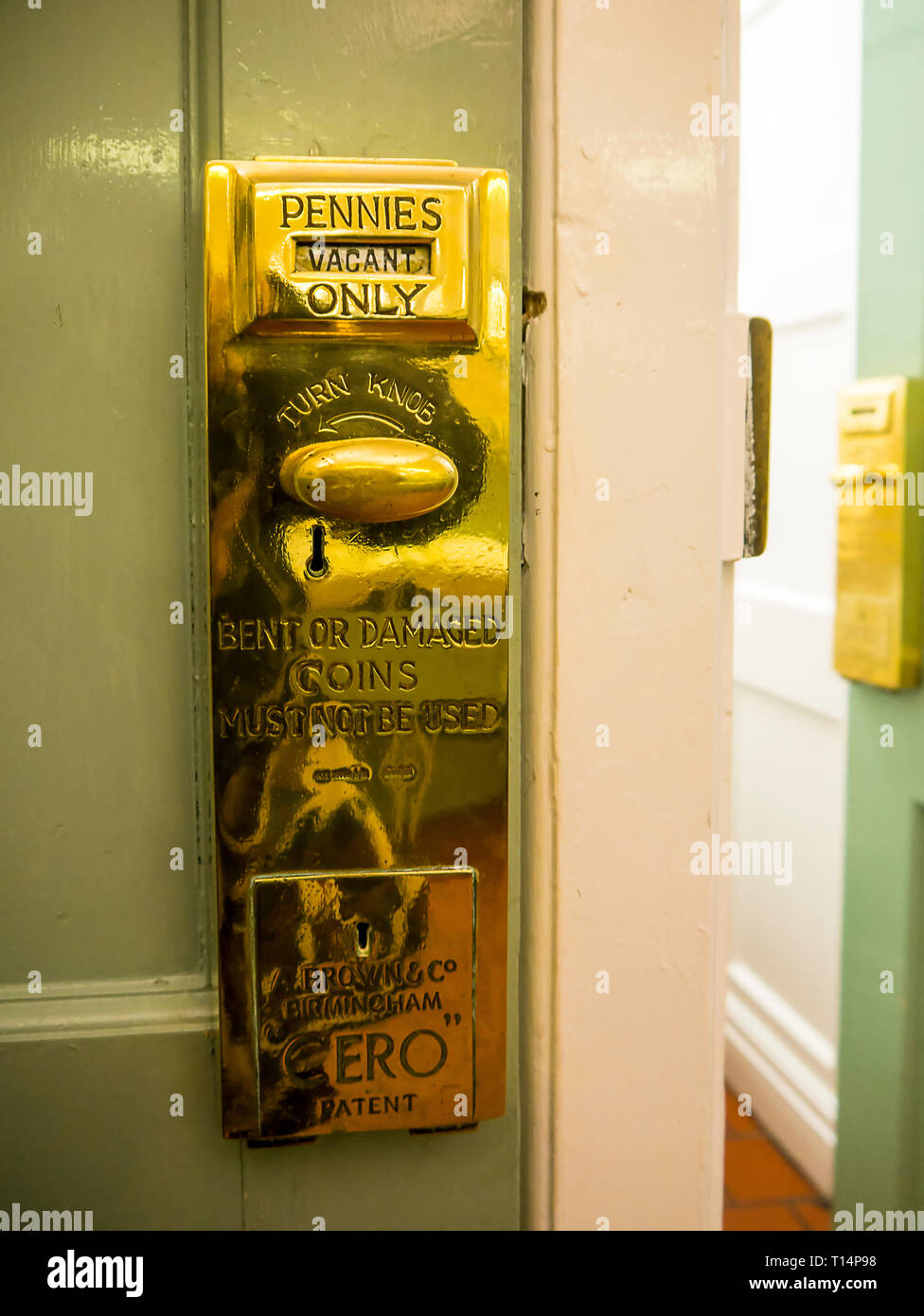 Antique Brass Mechanisms on Ladies Room Toilet Doors at the Lady Lever