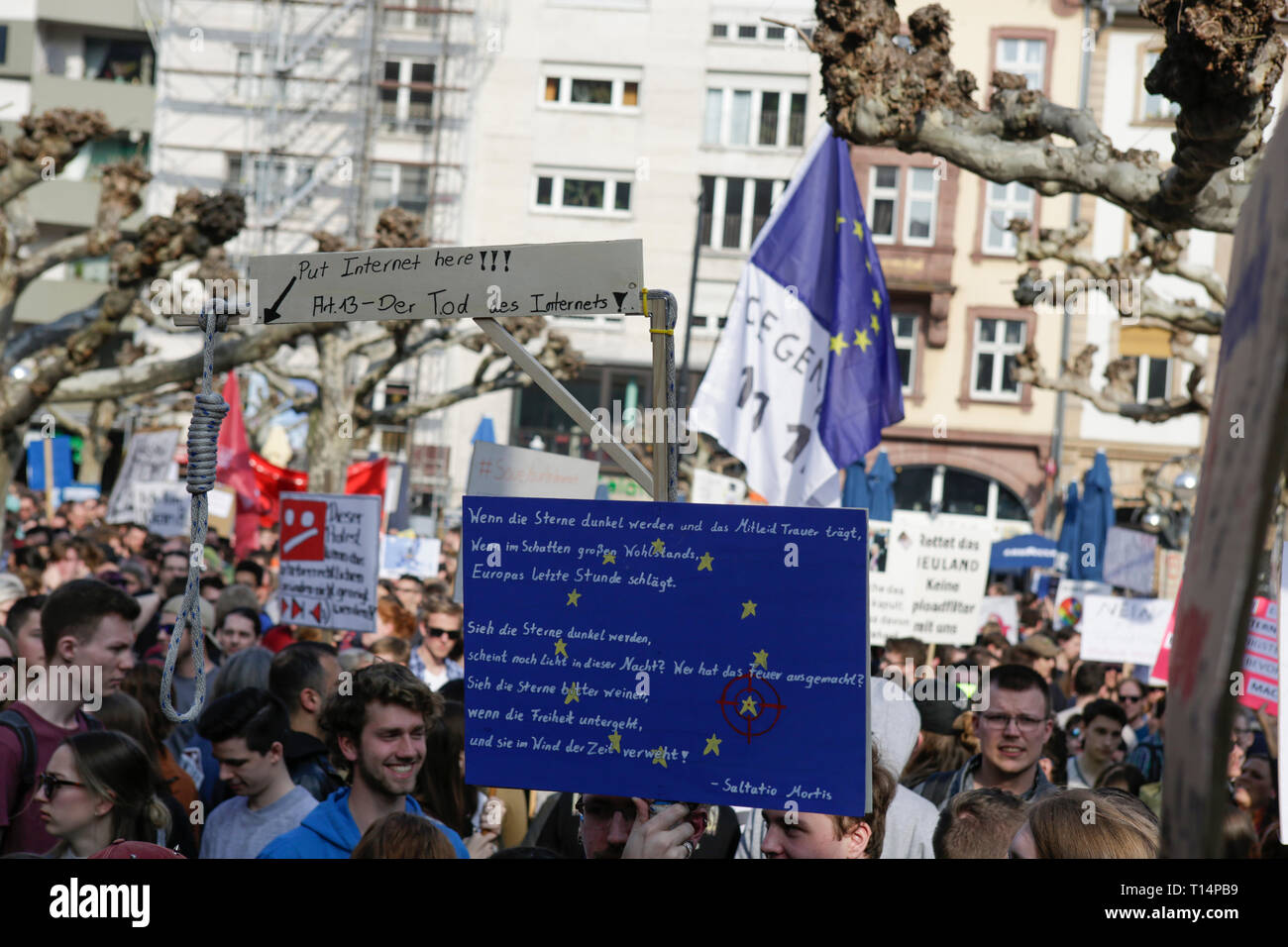 Frankfurt, Germany. 23rd Mar, 2019. Protesters have assembled with signs outside the Paulskirche in Frankfurt. More than 15,000 protesters marched through Frankfurt calling for the Internet to remain free and to not to pass the new EU Copyright Directive into law. The protest was part of a Germany wide day of protest against the EU directive. Credit: Michael Debets/Pacific Press/Alamy Live News Stock Photo