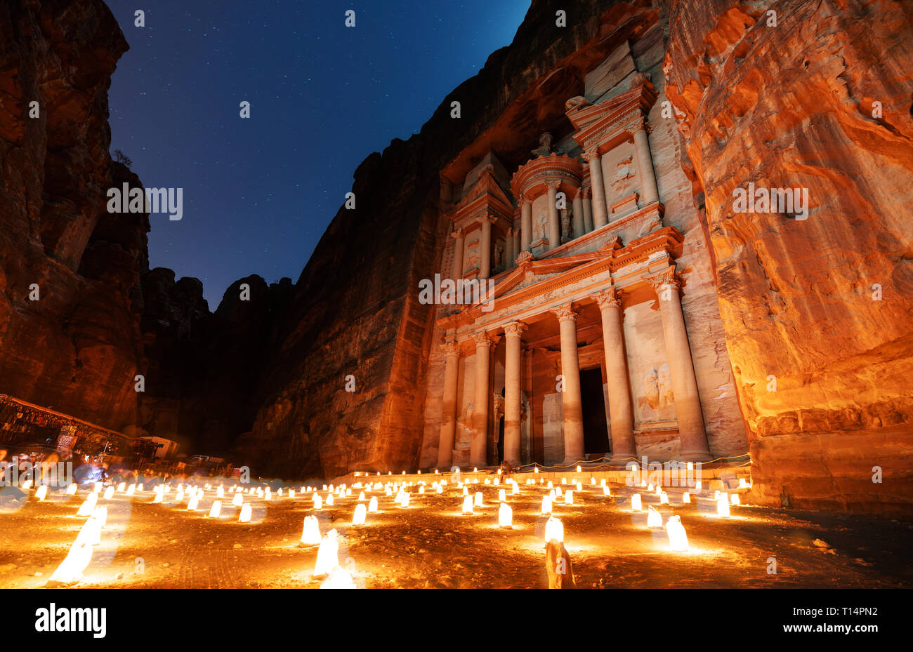 Petra by night, ancient architecture in canyon, Petra in Jordan. The rose city at night, famous travel destination in Middle-East, Jordan Stock Photo