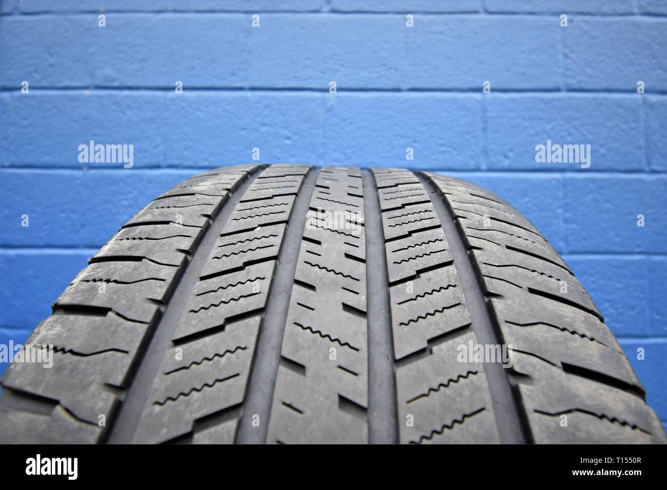 Trash Tires used as bumpers and in Gardens and for chipping Stock Photo