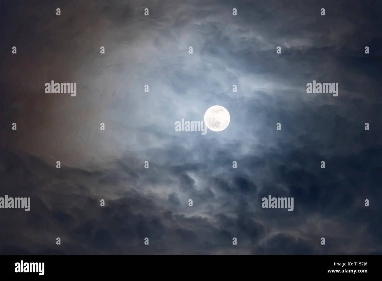 Full Moon With Clouds At Night Dramatic Clouds In The Moonlight Stock Photo Alamy