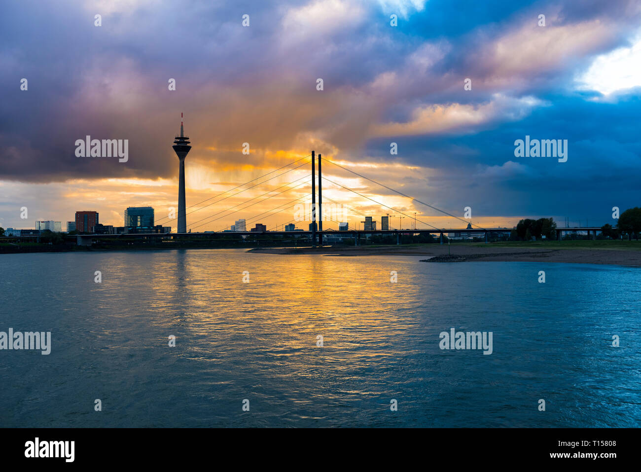Germany, Duesseldorf, Oberkassel Bridge with Media Harbour and television tower in the background Stock Photo
