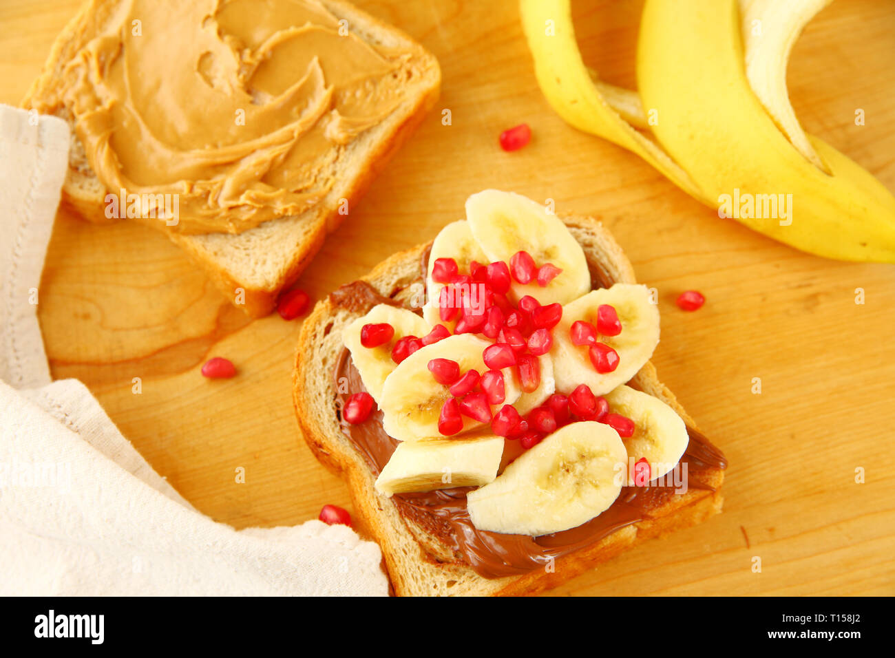 Peanut butter sandwich with chocolate hazelnut spread, bananas and