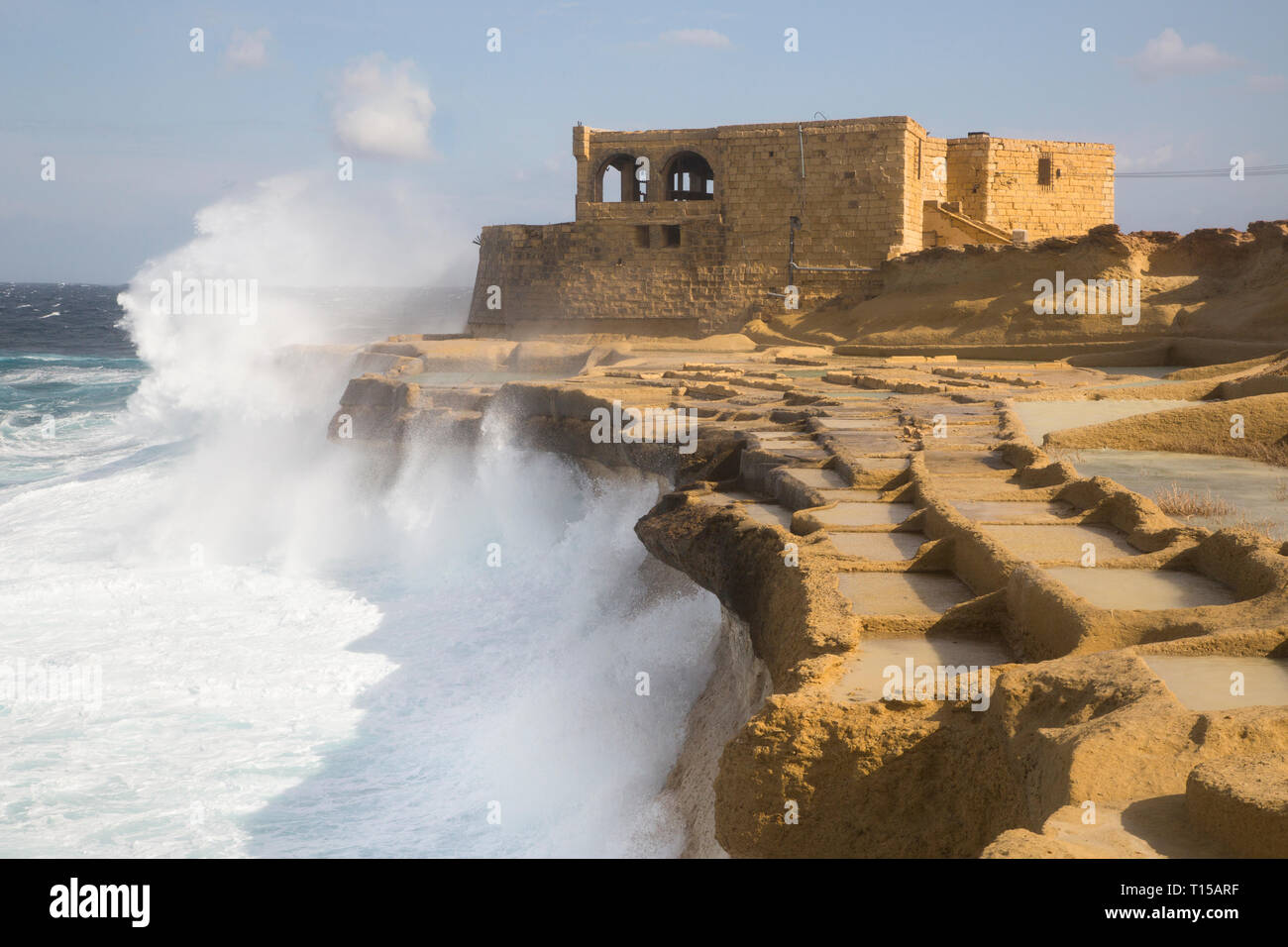 Malta, Gozo, salt pans and house Stock Photo