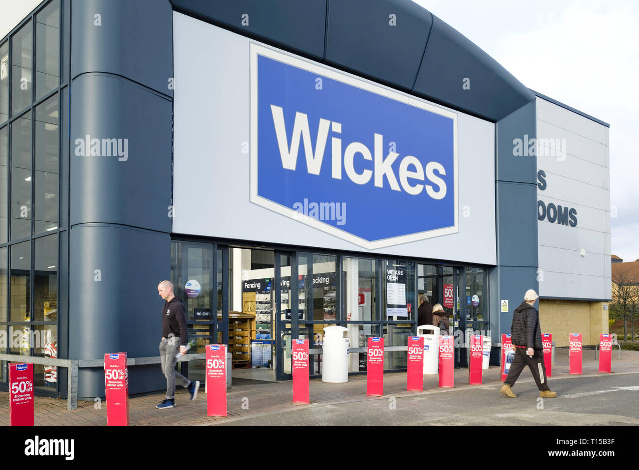 Milton Keynes, UK - February 11, 2019. Customers enter a Wickes DIY store. Stock Photo