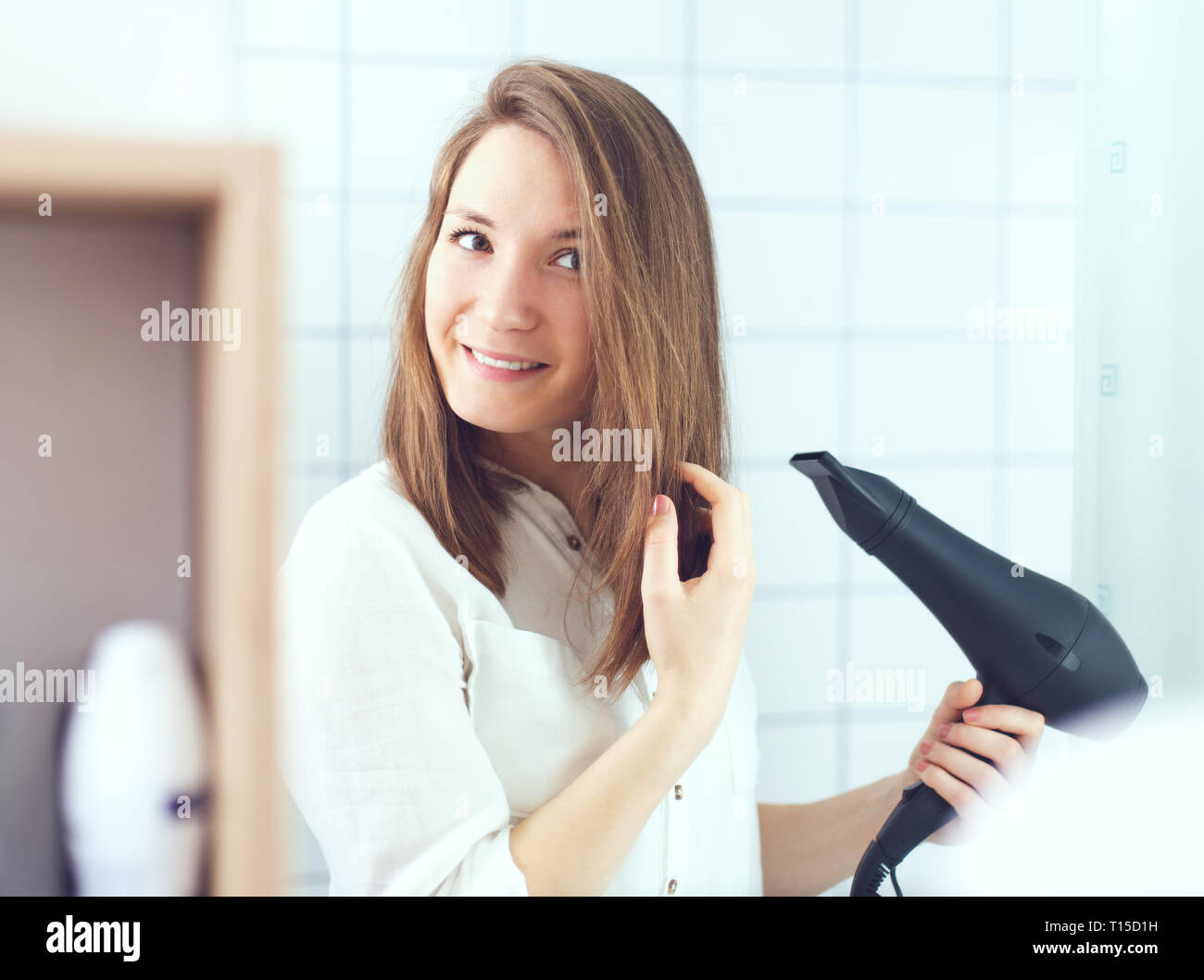 Hand hair dryer hi-res stock photography and images - Alamy