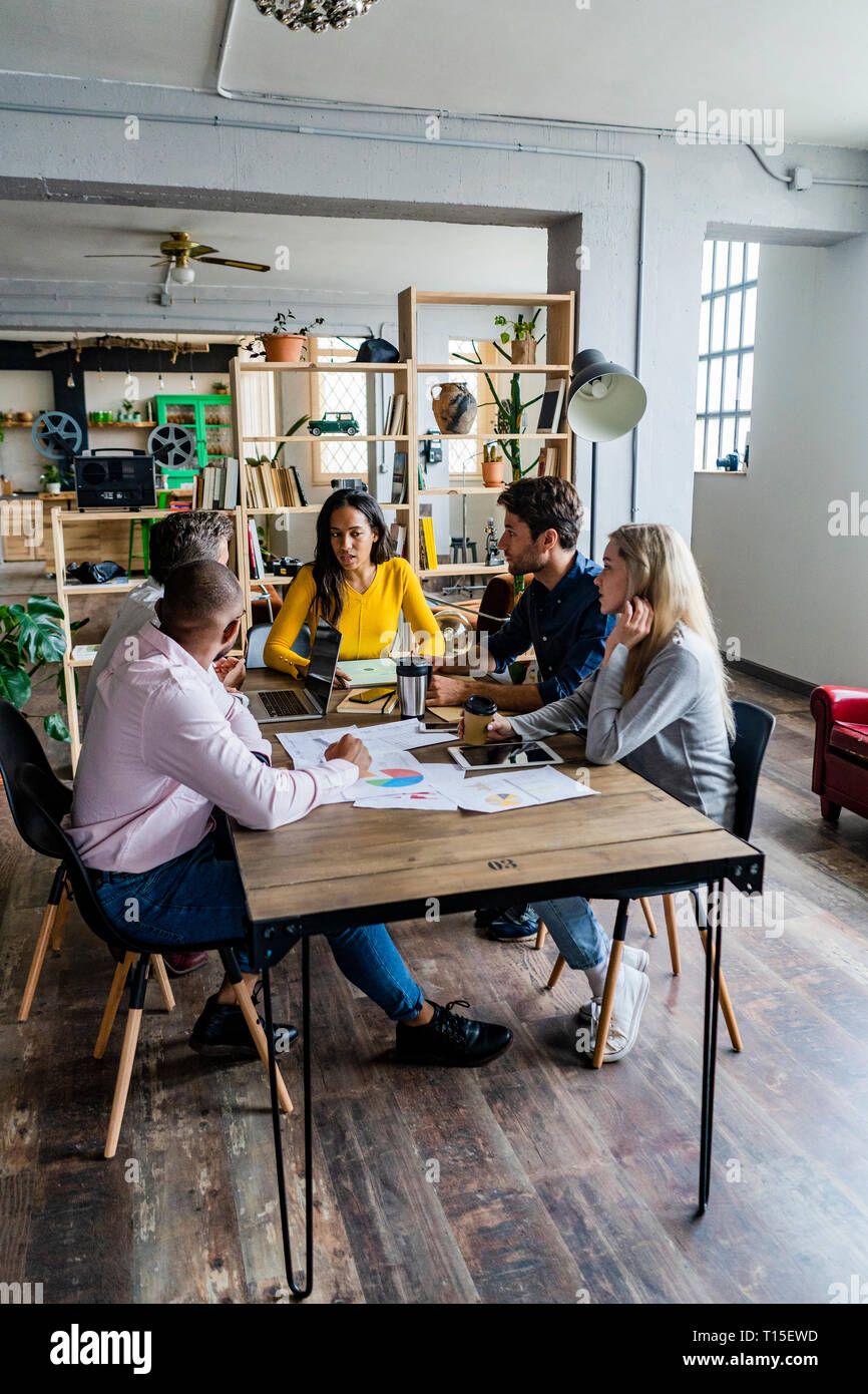 Business team having a meeting in loft office Stock Photo