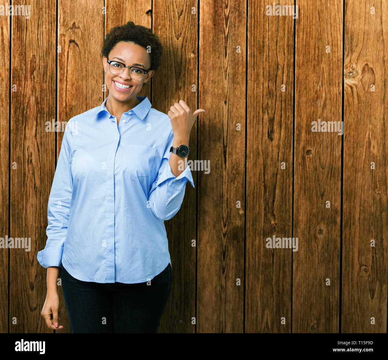 Young beautiful african american business woman over isolated ...