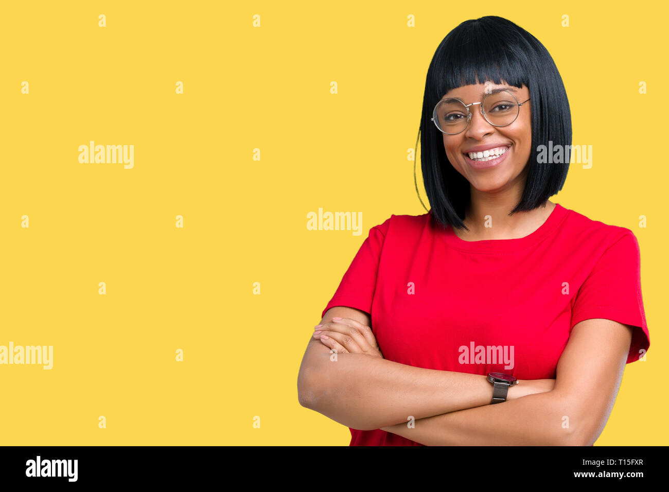 Beautiful young african american woman wearing glasses over isolated ...