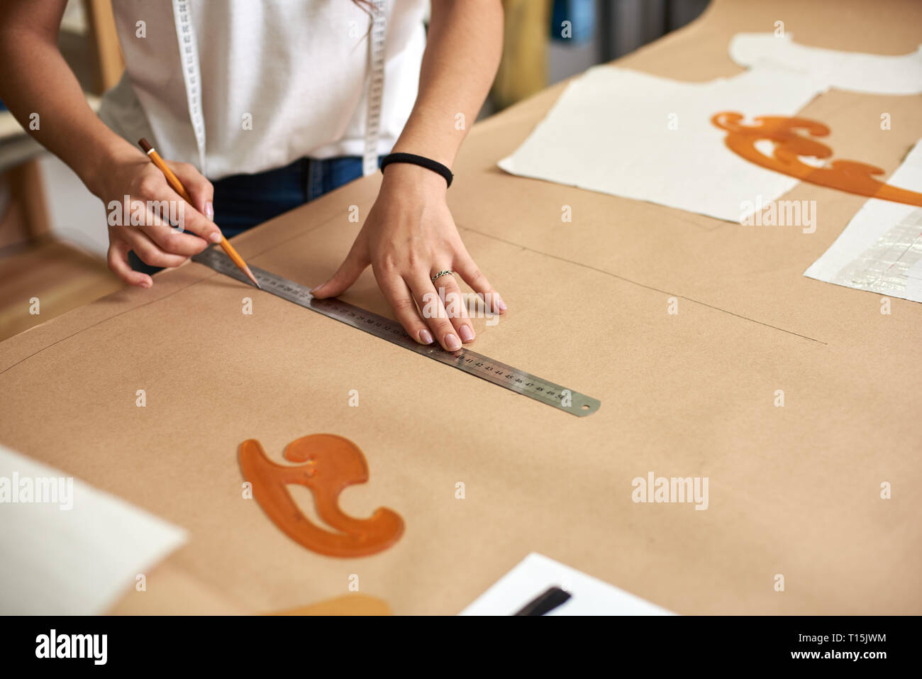 Workplace in design studio. Professional female designer hands close-up ...