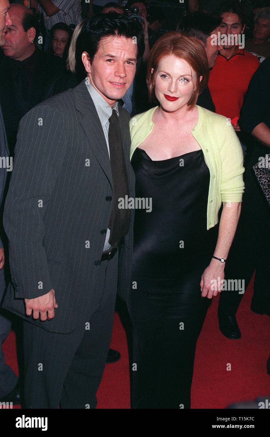 LOS ANGELES, CA. October 15, 1997: Actor Mark Wahlberg & actress Julianne Moore at the premiere of their new movie, 'Boogie Nights.' The movie is about a family of actors & filmmakers in the adult movie business. Stock Photo