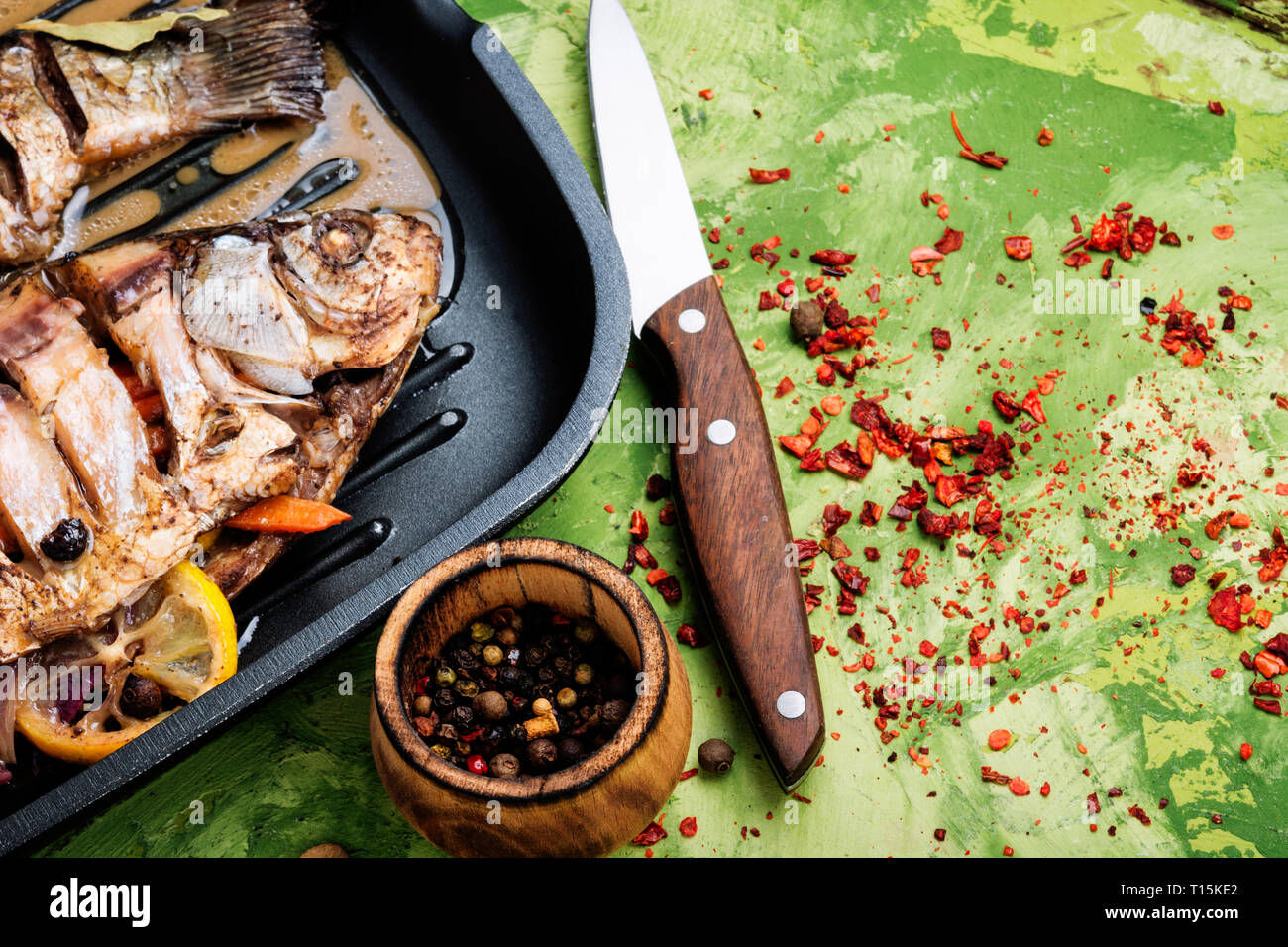 Grilled delicious fish.Baked fish with citrus,vegetable and spices in