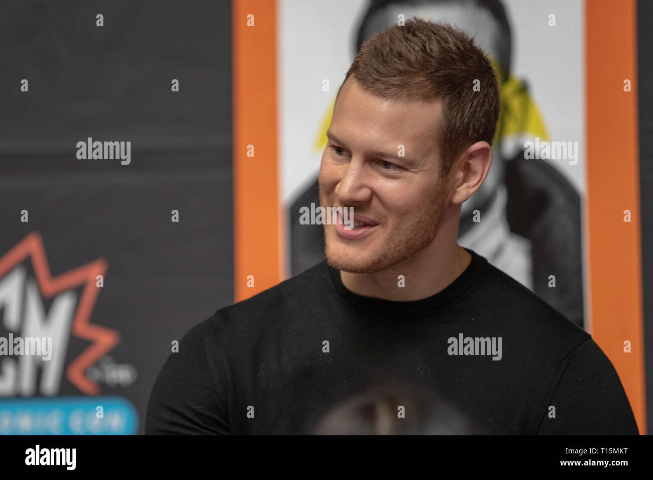 Birmingham, UK. Saturday 23 March 2019.Tom Hopper from The Umbrella Academy during an autograph session, on the 1st day of the MCM Comic Con Birmingham at the NEC  , ? Jason Richardson / 17�Թ����� Live News Stock Photo