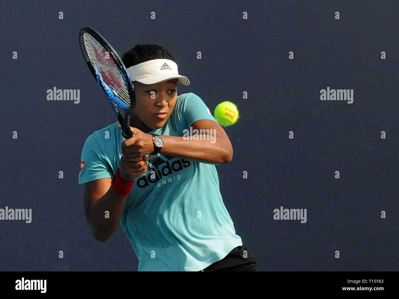 Miami, USA. 21st Mar, 2019.  Naomi Osaka of Japan plays on a practice court at the Hard Rock Stadium at the Miami Open on March 21, 2019 in Miami Gardens, Florida. (Paul Hennessy/Alamy) Credit: Paul Hennessy/Alamy Live News Stock Photo
